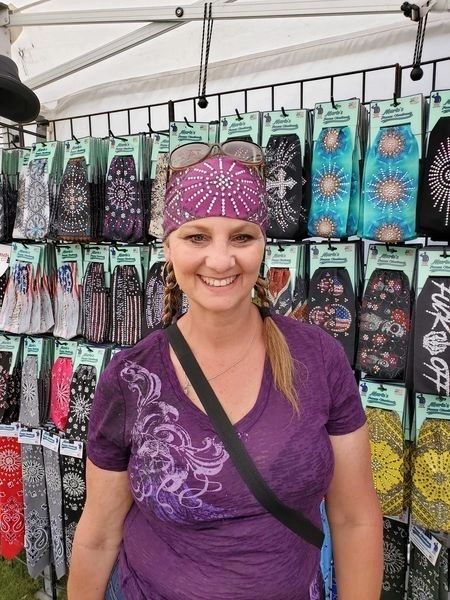 Outdoor festival biker model with custom bandana.